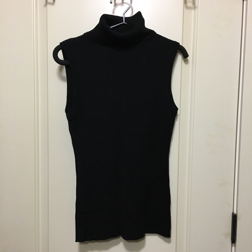 Black Ribbed sleeveless turtleneck sweater.